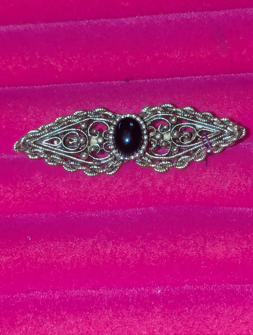 Vintage-Style Gold Filigree Brooch with Black Cabochon